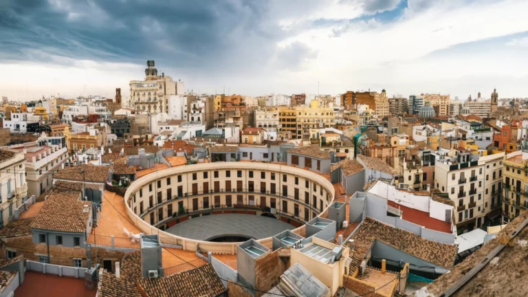 Panoramic view of Valencia Spain cityscape showing the futuristic City of Arts and Sciences and Turia Gardens